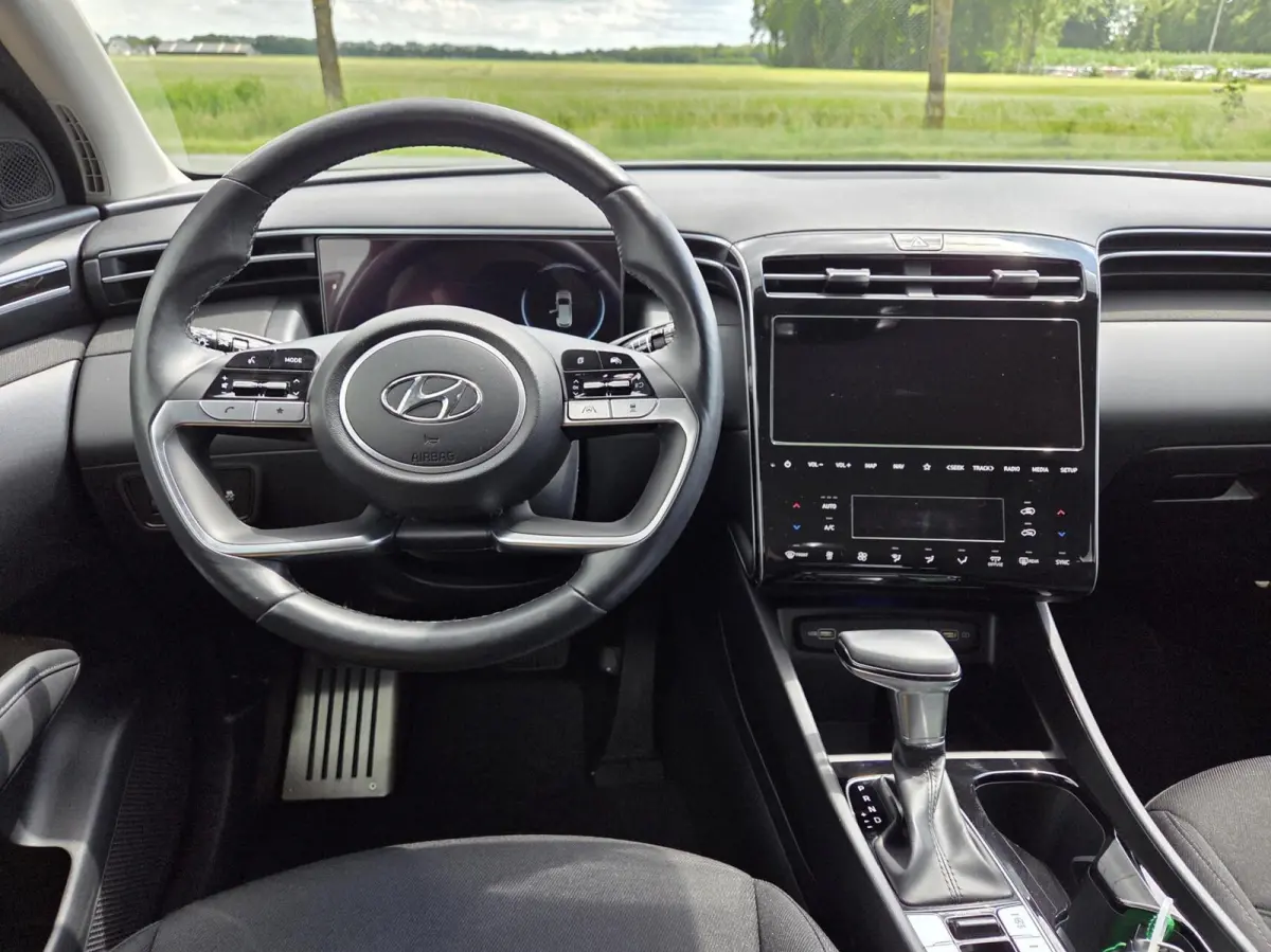 1.6 T-GDI MHEV Comfort Smart | Automaat | Elektr achterklep / Keyless / Adaptive