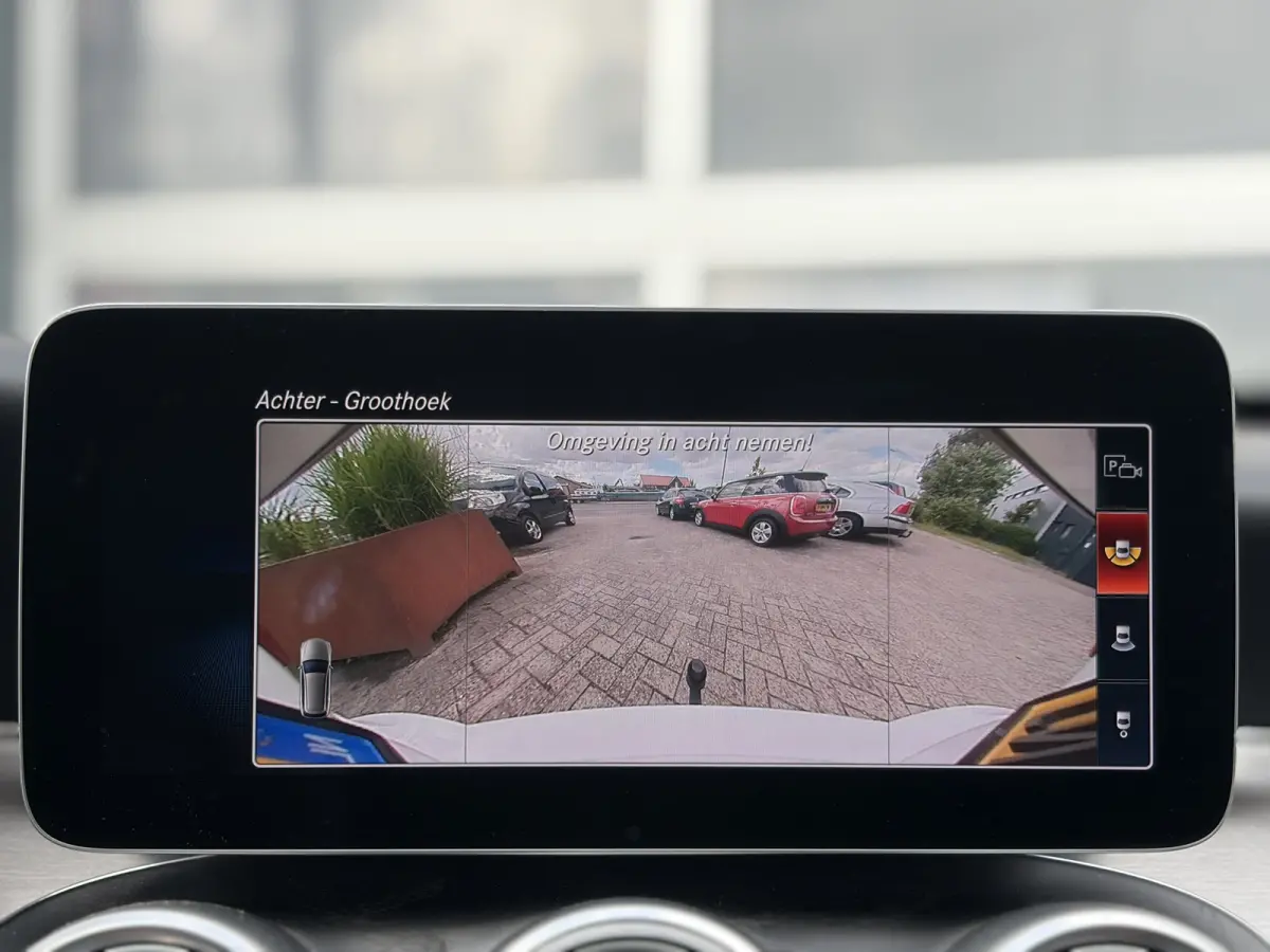 180 Business Solution AMG 156pk | Virtual Cockpit | Achteruitrijcamera | Bluetooth | Cruise control adaptief met stop&go en stuurhulp | DAB | Elektrisch glazen panorama-dak | Matrix led kopl