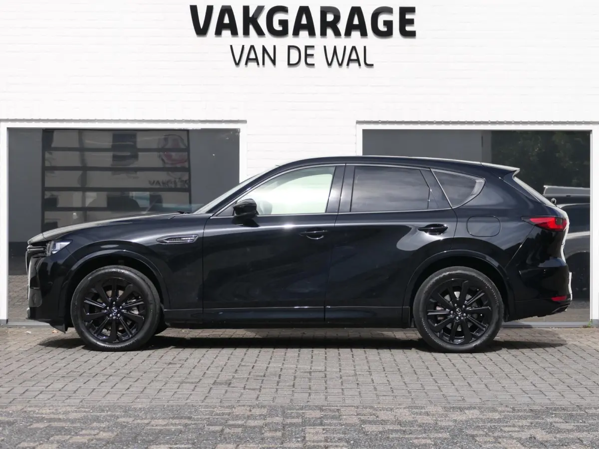 2.5 e-SkyActiv PHEV Homura | Panoramadak | Trekhaak | 360°-camera | BOSE | Memory | Stoelventilatie | Stuur-/Stoelverwarming V+A | Apple-/Android Carplay | Dodehoek detectie | ACC