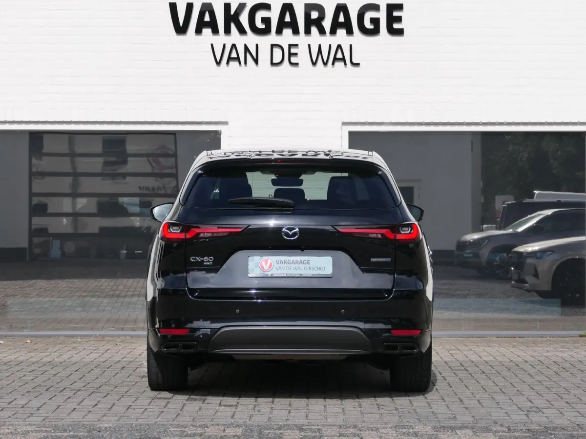 2.5 e-SkyActiv PHEV Homura | Panoramadak | Trekhaak | 360°-camera | BOSE | Memory | Stoelventilatie | Stuur-/Stoelverwarming V+A | Apple-/Android Carplay | Dodehoek detectie | ACC