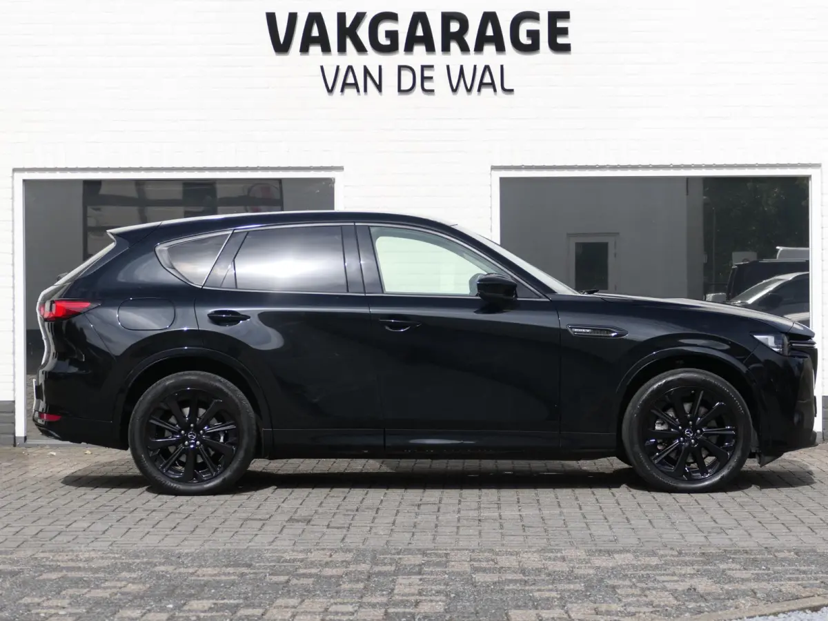 2.5 e-SkyActiv PHEV Homura | Panoramadak | Trekhaak | 360°-camera | BOSE | Memory | Stoelventilatie | Stuur-/Stoelverwarming V+A | Apple-/Android Carplay | Dodehoek detectie | ACC