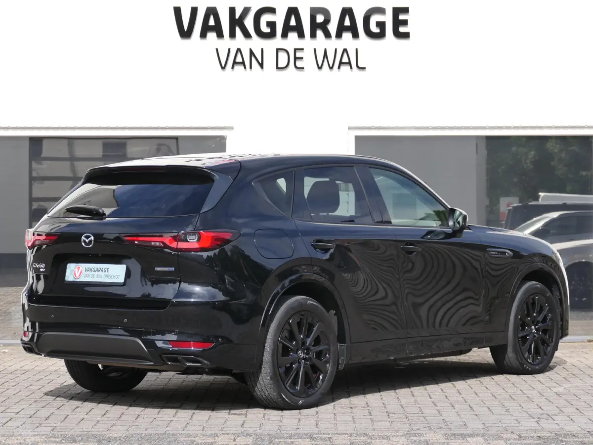 2.5 e-SkyActiv PHEV Homura | Panoramadak | Trekhaak | 360°-camera | BOSE | Memory | Stoelventilatie | Stuur-/Stoelverwarming V+A | Apple-/Android Carplay | Dodehoek detectie | ACC