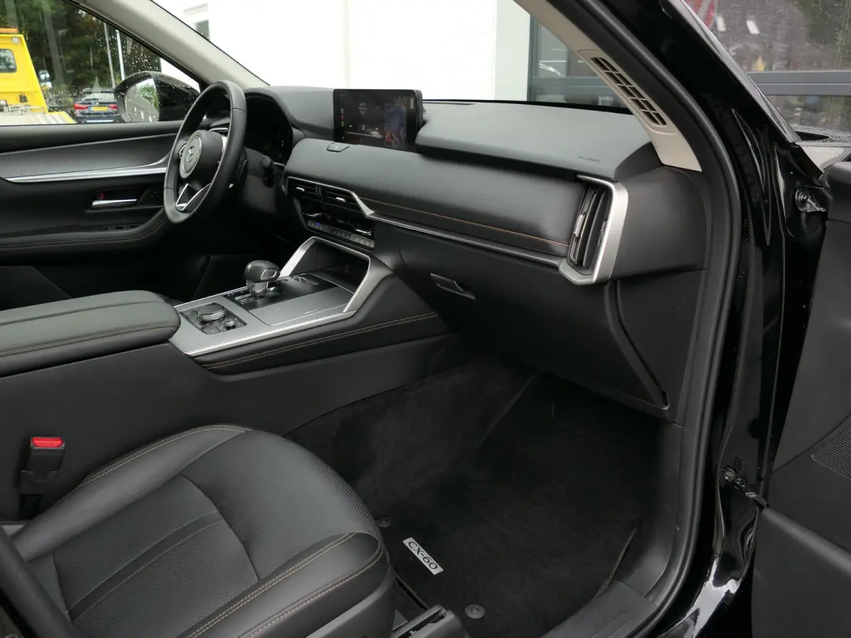 2.5 e-SkyActiv PHEV Homura | Panoramadak | Trekhaak | 360°-camera | BOSE | Memory | Stoelventilatie | Stuur-/Stoelverwarming V+A | Apple-/Android Carplay | Dodehoek detectie | ACC