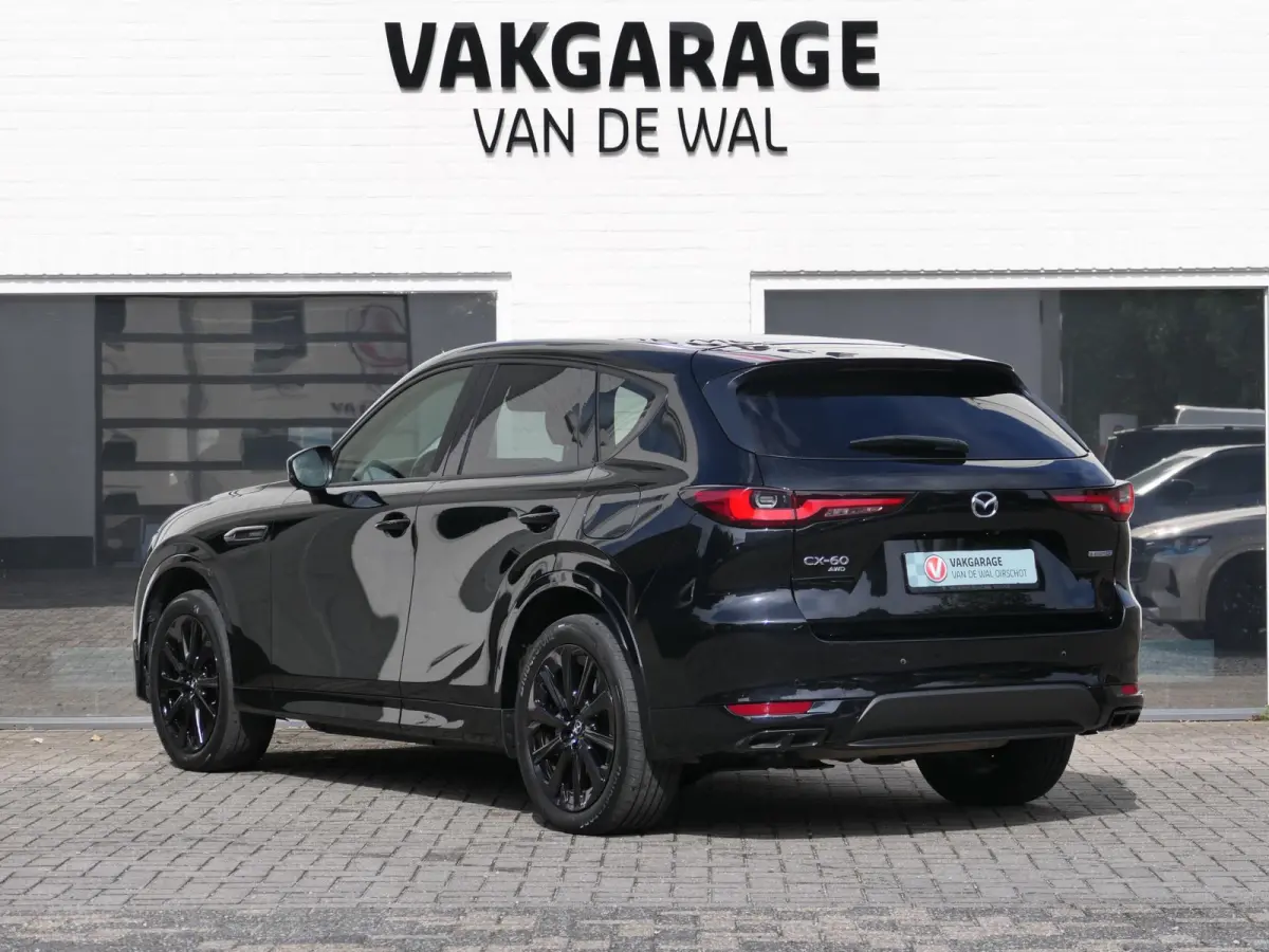 2.5 e-SkyActiv PHEV Homura | Panoramadak | Trekhaak | 360°-camera | BOSE | Memory | Stoelventilatie | Stuur-/Stoelverwarming V+A | Apple-/Android Carplay | Dodehoek detectie | ACC