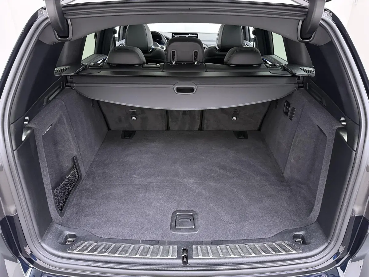 Executive 80 kWh M-Sport |SOH 99% | ELEKTRISCHE TREKHAAK| ELEKTRISCHE ACHTERKLEP| PANORAMADAK| DRIVING ASSISTENT PROFESSIONAL| DODE HOEK SENSOR| STOELVERWARMING