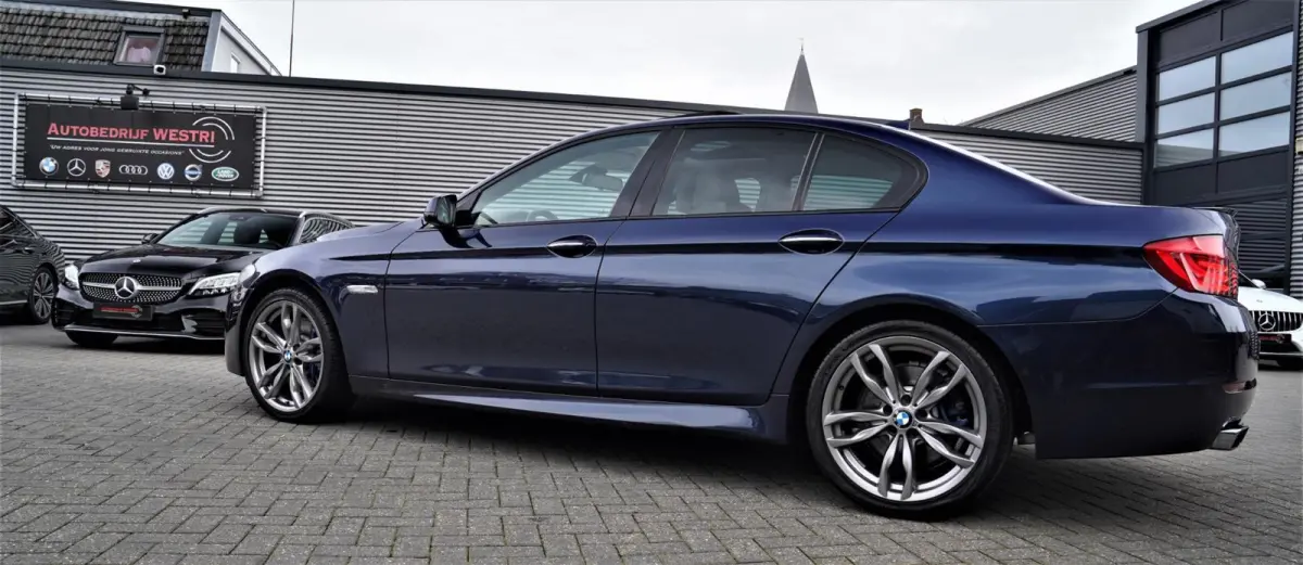 550i High Executive | M-pakket | Adaptieve cruise | Botswaarschuwing | Trekhaak elektrisch | Schuif/kanteldak | HuD |