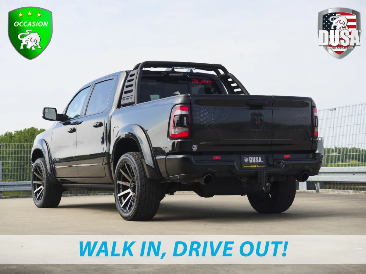 1500 Limited | 5.7 V8 | 4x4 Crew Cab | 5'7 | Guerrilla Exhaust | LED Pack | Flipcover | RAMBAR | Cobra Wrap | Chameleon Tint