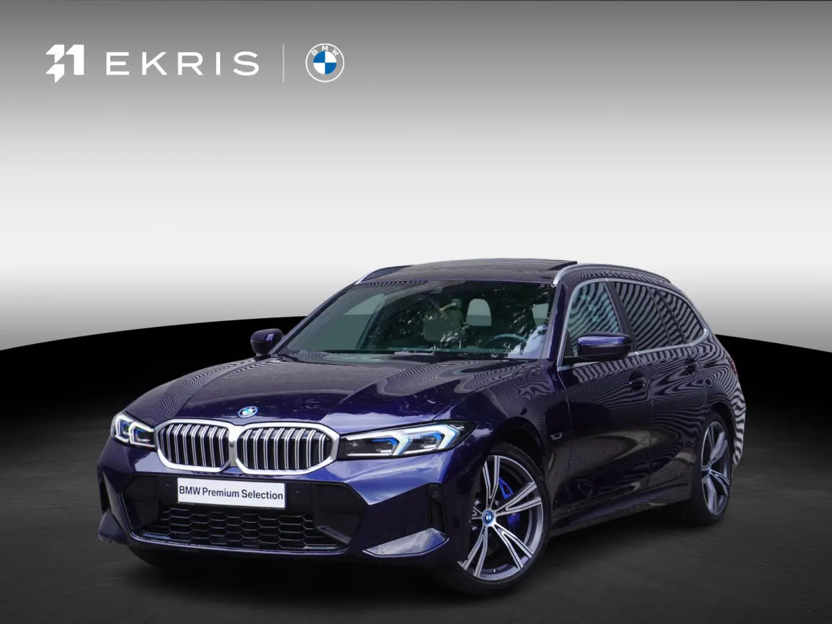 320e | M Sportpakket | Comfort Pack | Trekhaak met elektrisch wegklapbare kogel | Glazen panoramadak | HIFI System Harman Kardon | Stuurwielrand verwarmd