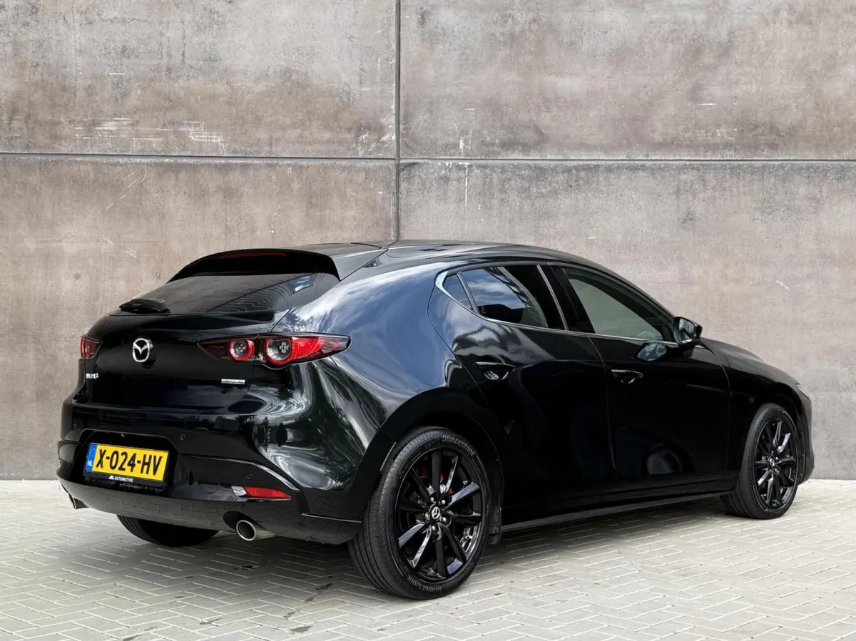 2.0 e-SkyActiv-G M Hybrid Luxury | Bose Audio | HUD | Blindspot | Adaptieve Cruise | Camera | Leder |