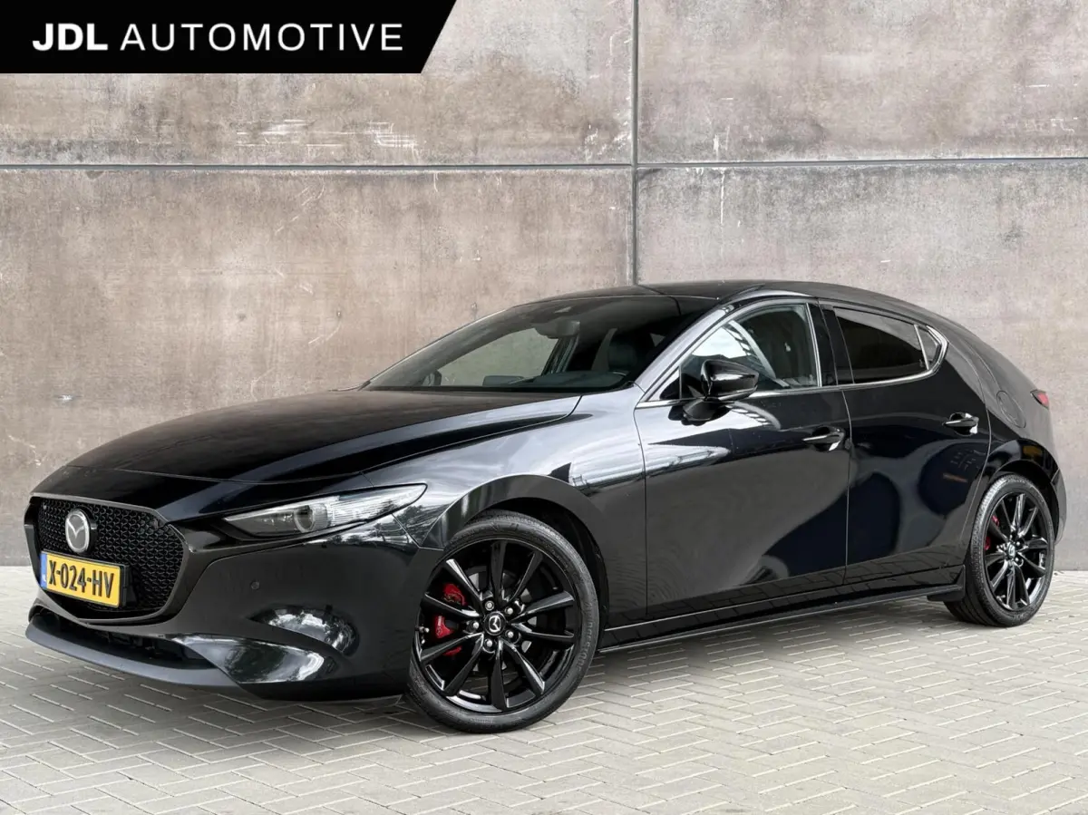 2.0 e-SkyActiv-G M Hybrid Luxury | Bose Audio | HUD | Blindspot | Adaptieve Cruise | Camera | Leder |