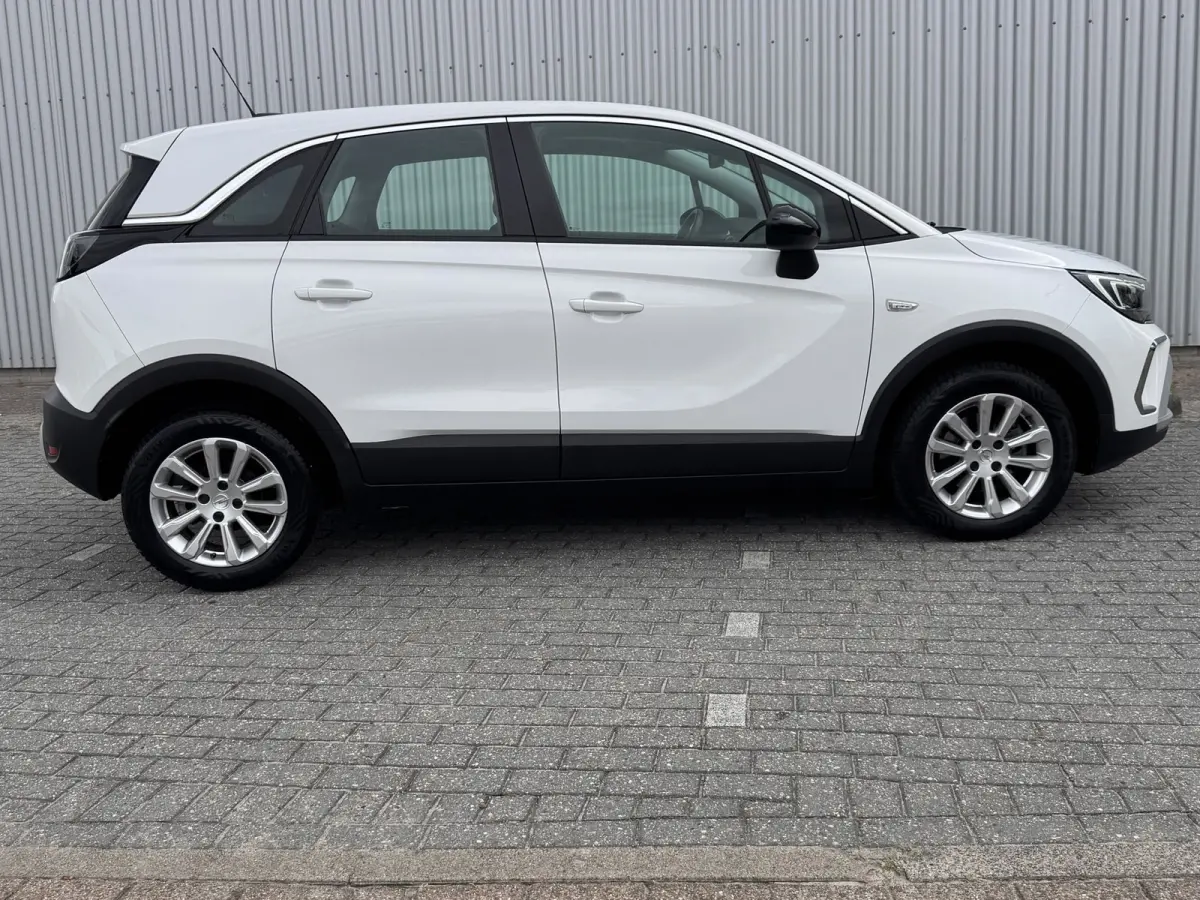 1.2 Turbo Elegance 110PK | Lage km stand! | Parkeersensoren | Navigatie | Cruise Control | Apple Carplay / Android Auto | AGR-Bestuurdersstoel | | Buitenspiegels elektrisch verstel- en verwa