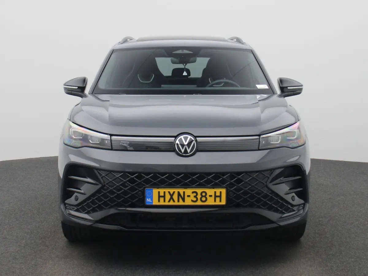 1.5 eHybrid R-Line Edition 204 PK| Origineel Nederlands | 1e Eigenaar | Panoramdak | Navigatie | Achteruitrijcamera | Achterklep Elektrisch | Stoelverwarming | Stuurwielverwarming