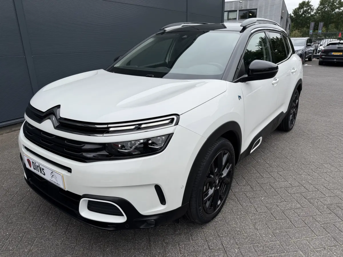 225pk Plug-in Hybrid Shine (Leder incl verwarming/geheugen/massage - Elektrische Klep - 19" Zwart - Adaptieve Cruise Controle - Keyless Entry - Camera)