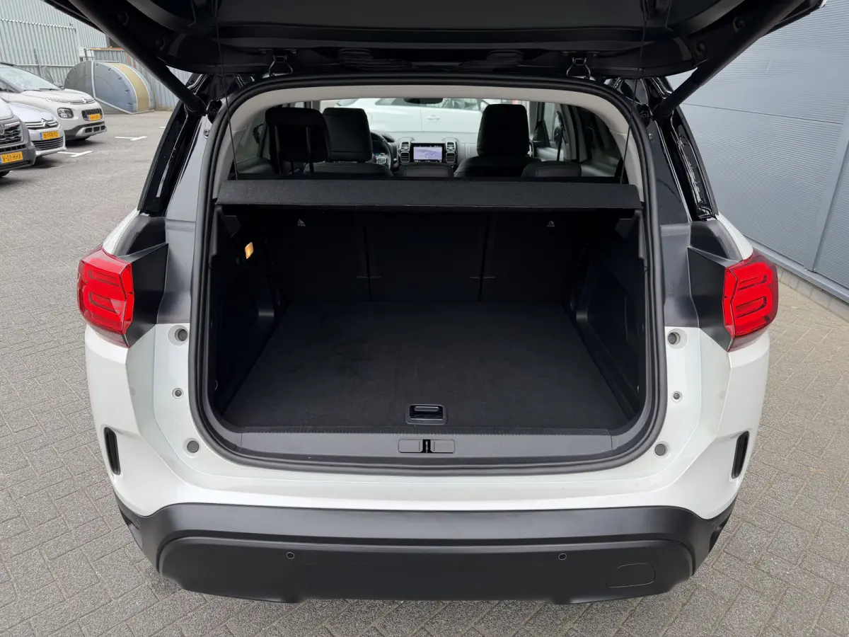 225pk Plug-in Hybrid Shine (Leder incl verwarming/geheugen/massage - Elektrische Klep - 19" Zwart - Adaptieve Cruise Controle - Keyless Entry - Camera)