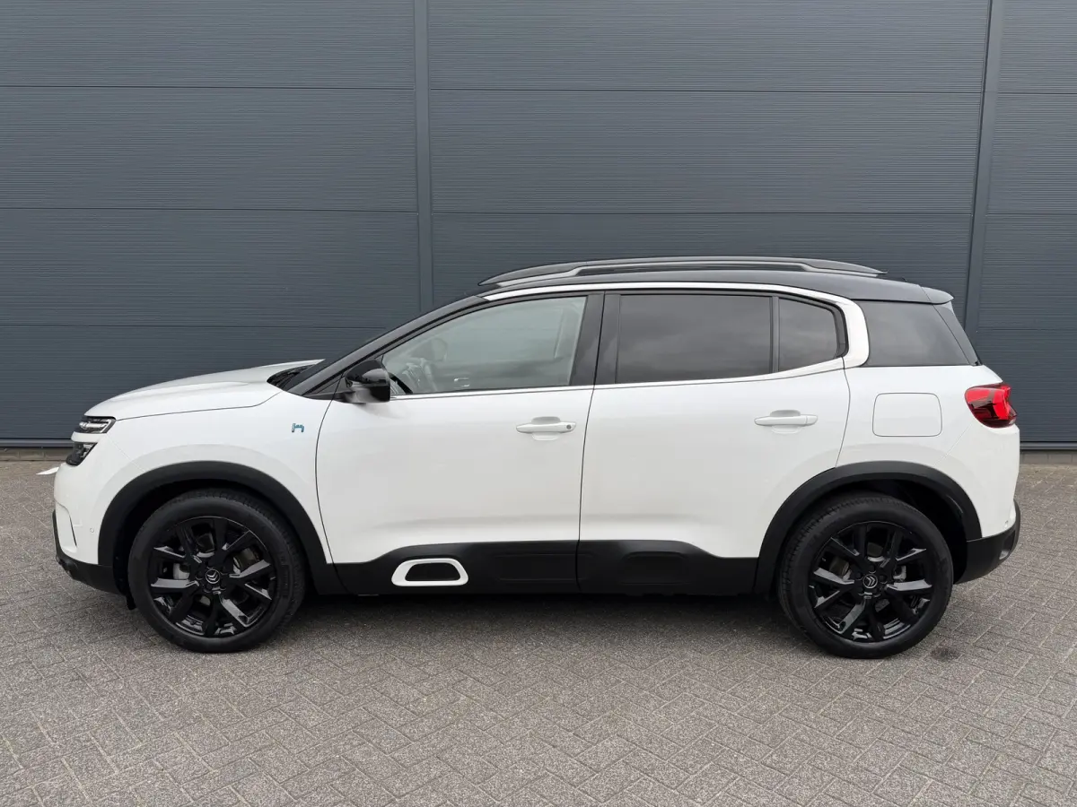 225pk Plug-in Hybrid Shine (Leder incl verwarming/geheugen/massage - Elektrische Klep - 19" Zwart - Adaptieve Cruise Controle - Keyless Entry - Camera)