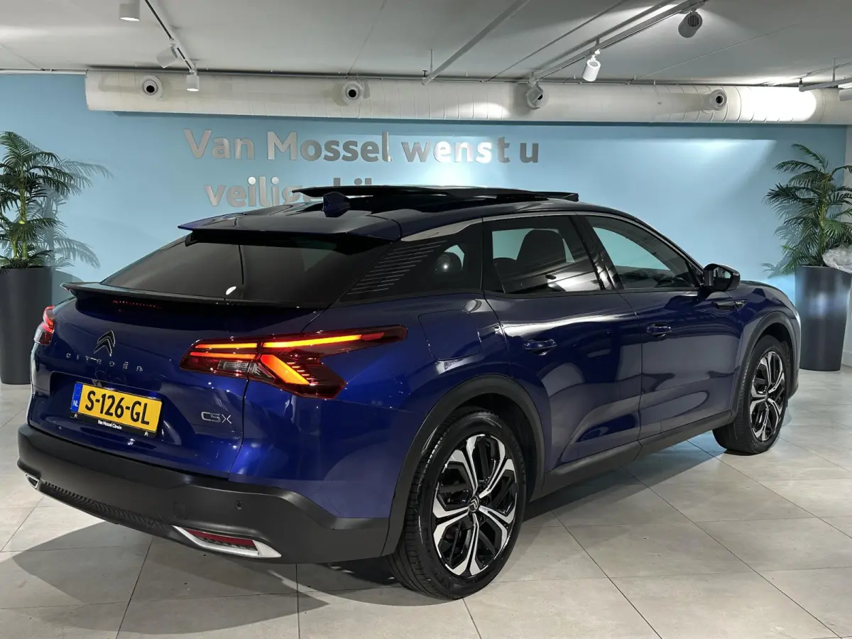 1.6 Plug-in Hybrid 225 Shine | Panoramisch schuif- kanteldak | Camera | Climate control | Navigatie