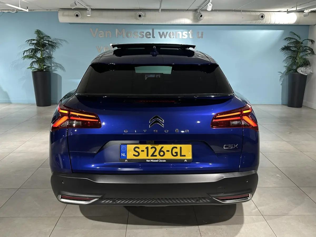 1.6 Plug-in Hybrid 225 Shine | Panoramisch schuif- kanteldak | Camera | Climate control | Navigatie