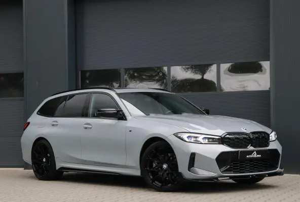 330e xDrive M-performance Aero Pakket Panodak Headup Trekhaak Stoel/Stuur verwarming Carplay 76000km
