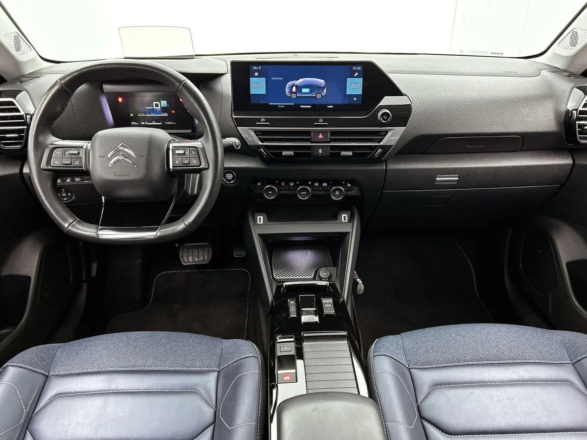 Shine 136pk 50 kWh Automaat | 1ste Eigenaar | Head-Up Display | Navigatie | Winter-Pakket | Climate Control | Adaptieve Cruise Control | Camera | full-LED | 18"LMV |