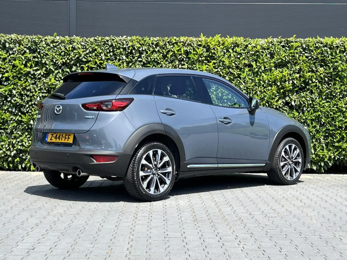 2.0 SkyActiv-G 121 LUXURY, NAVIGATIE, CRUISE CONTROL, CLIMATE CONTROL, STOELVERWARMING, HALF LEDER, DODEHOEK, KEYLESS, HUD, LED, DAB, LICHTMETAAL 18"