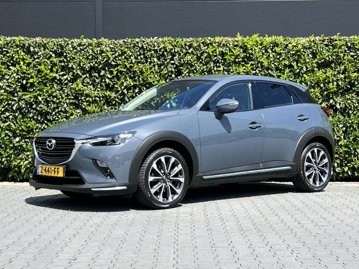 2.0 SkyActiv-G 121 LUXURY, NAVIGATIE, CRUISE CONTROL, CLIMATE CONTROL, STOELVERWARMING, HALF LEDER, DODEHOEK, KEYLESS, HUD, LED, DAB, LICHTMETAAL 18"