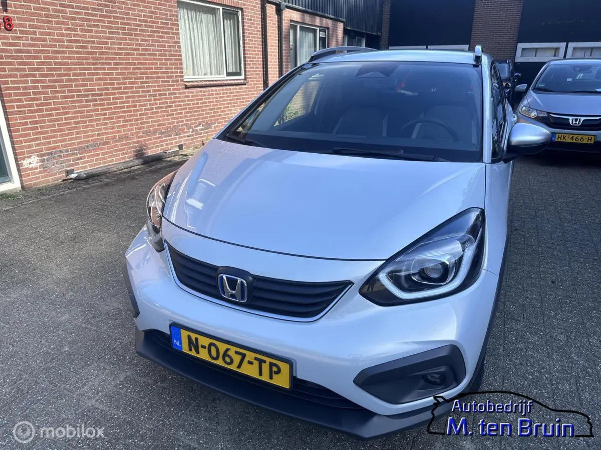 1.5 e:HEV Crosstar+Afn.Trekhaak/Sunlight Silver/1e eigenaar