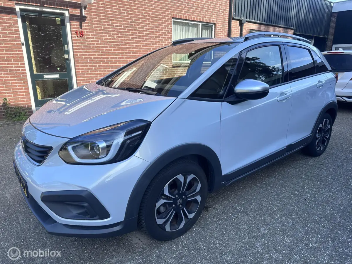 1.5 e:HEV Crosstar+Afn.Trekhaak/Sunlight Silver/1e eigenaar