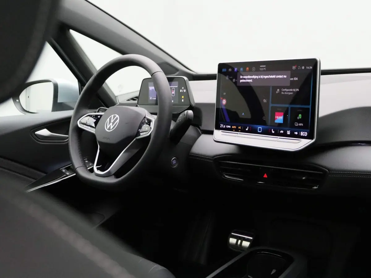 Pro Business 59 kWh | EM | Navigatie | Draadloze Apple Carplay | Adaptieve cruise control | Lane assist | Stoelverwarming | Stuurwielverwarming | Climate control | Achteruitrij camera | Park