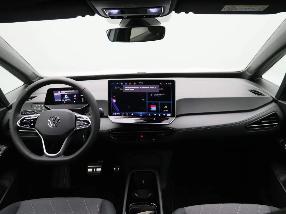 Pro Business 59 kWh | EM | Navigatie | Draadloze Apple Carplay | Adaptieve cruise control | Lane assist | Stoelverwarming | Stuurwielverwarming | Climate control | Achteruitrij camera | Park