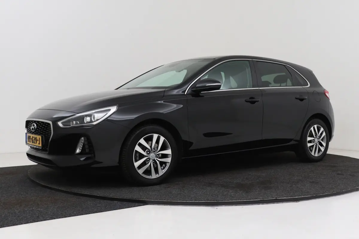 1.0 T-GDI First Edition | Trekhaak | Org NL | Climate Control | Camera | CarPlay |