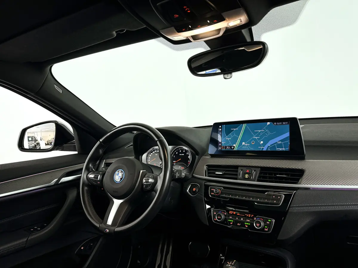 xDrive25e High Executive | Panoramadak | Parkeercamera | Head-up display | Stoelverwarming | Cruise control