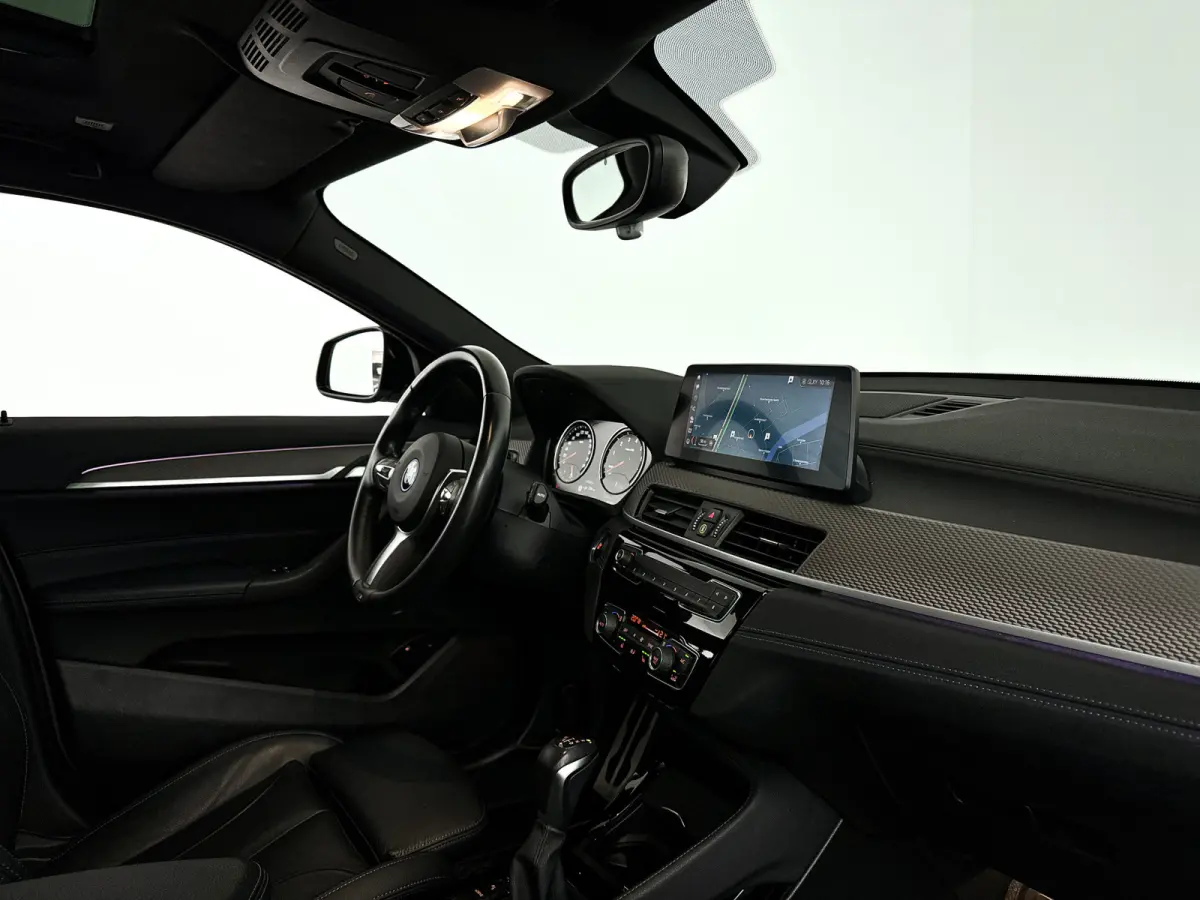 xDrive25e High Executive | Panoramadak | Parkeercamera | Head-up display | Stoelverwarming | Cruise control