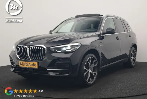 xDrive45e High Executive PHEV 395pk Dealer O.H. | Panodak | Luchtvering | 360 Camera | Adaptief Onderstel | Lederen Sportstoelen Memory & Verwarmd | Sfeerverlichting | Apple Carplay | Naviga