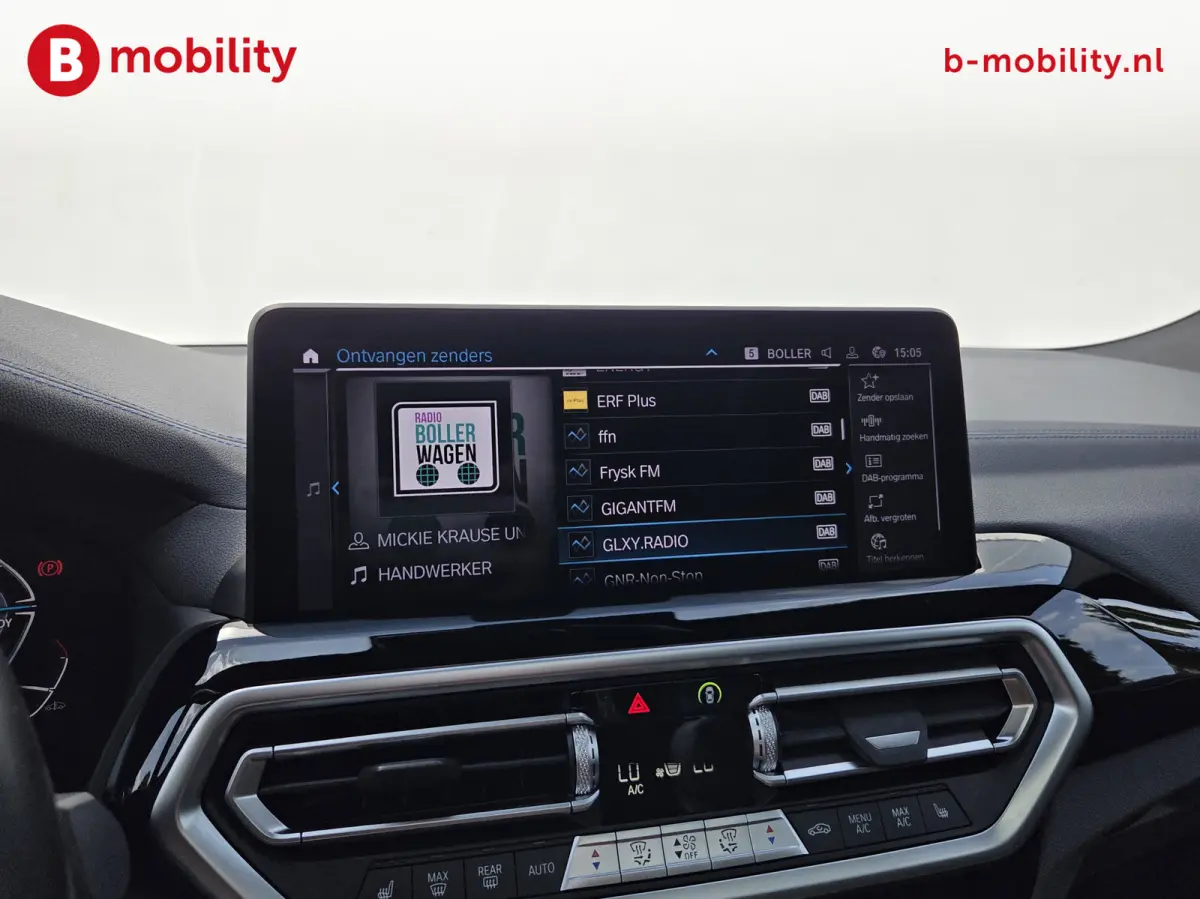 High Executive M-Sport 80 kWh SOH 98% 'Mineral-Weiss' Trekhaak Panoramdak Harman/Kardon | Adaptive Cruise Control | Elek. Stoelen | Head-Up | DAB
