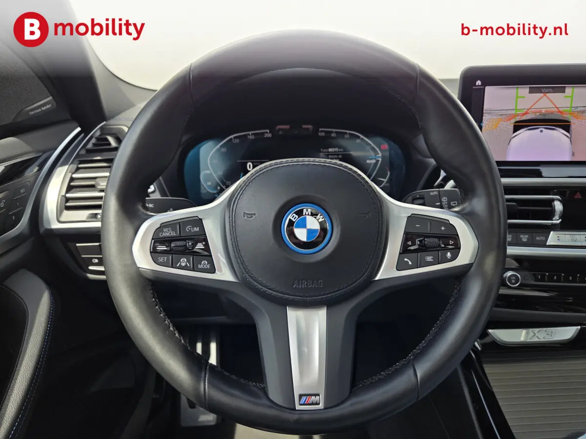 High Executive M-Sport 80 kWh SOH 98% 'Mineral-Weiss' Trekhaak Panoramdak Harman/Kardon | Adaptive Cruise Control | Elek. Stoelen | Head-Up | DAB