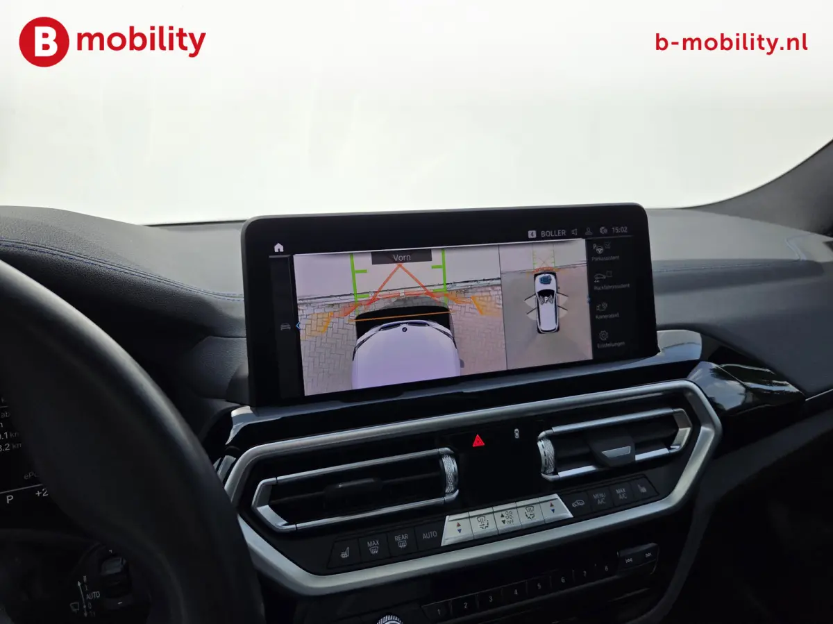 High Executive M-Sport 80 kWh SOH 98% 'Mineral-Weiss' Trekhaak Panoramdak Harman/Kardon | Adaptive Cruise Control | Elek. Stoelen | Head-Up | DAB
