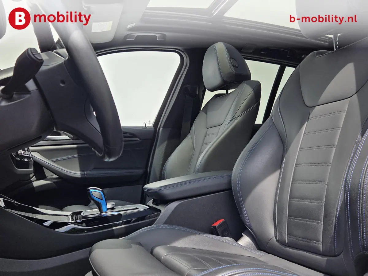 High Executive M-Sport 80 kWh SOH 98% 'Mineral-Weiss' Trekhaak Panoramdak Harman/Kardon | Adaptive Cruise Control | Elek. Stoelen | Head-Up | DAB