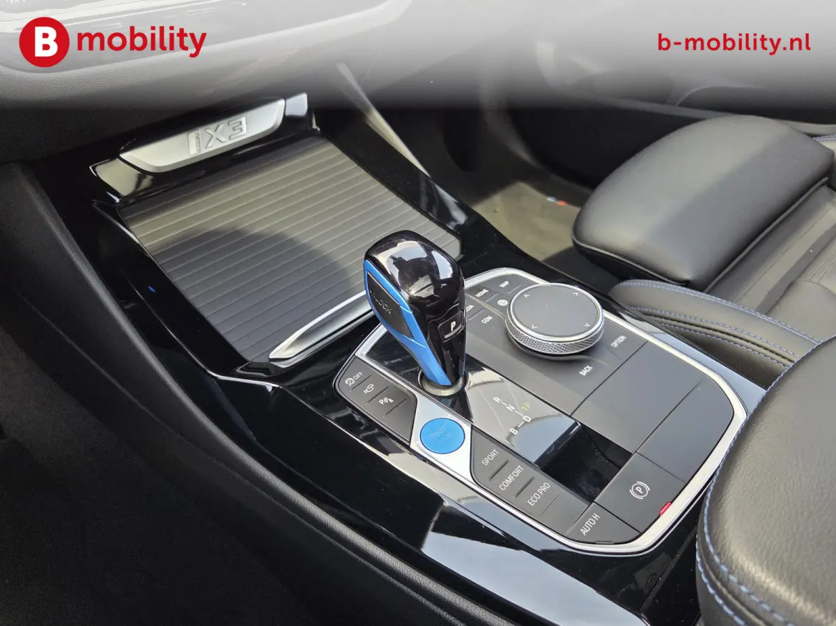 High Executive M-Sport 80 kWh SOH 98% 'Mineral-Weiss' Trekhaak Panoramdak Harman/Kardon | Adaptive Cruise Control | Elek. Stoelen | Head-Up | DAB