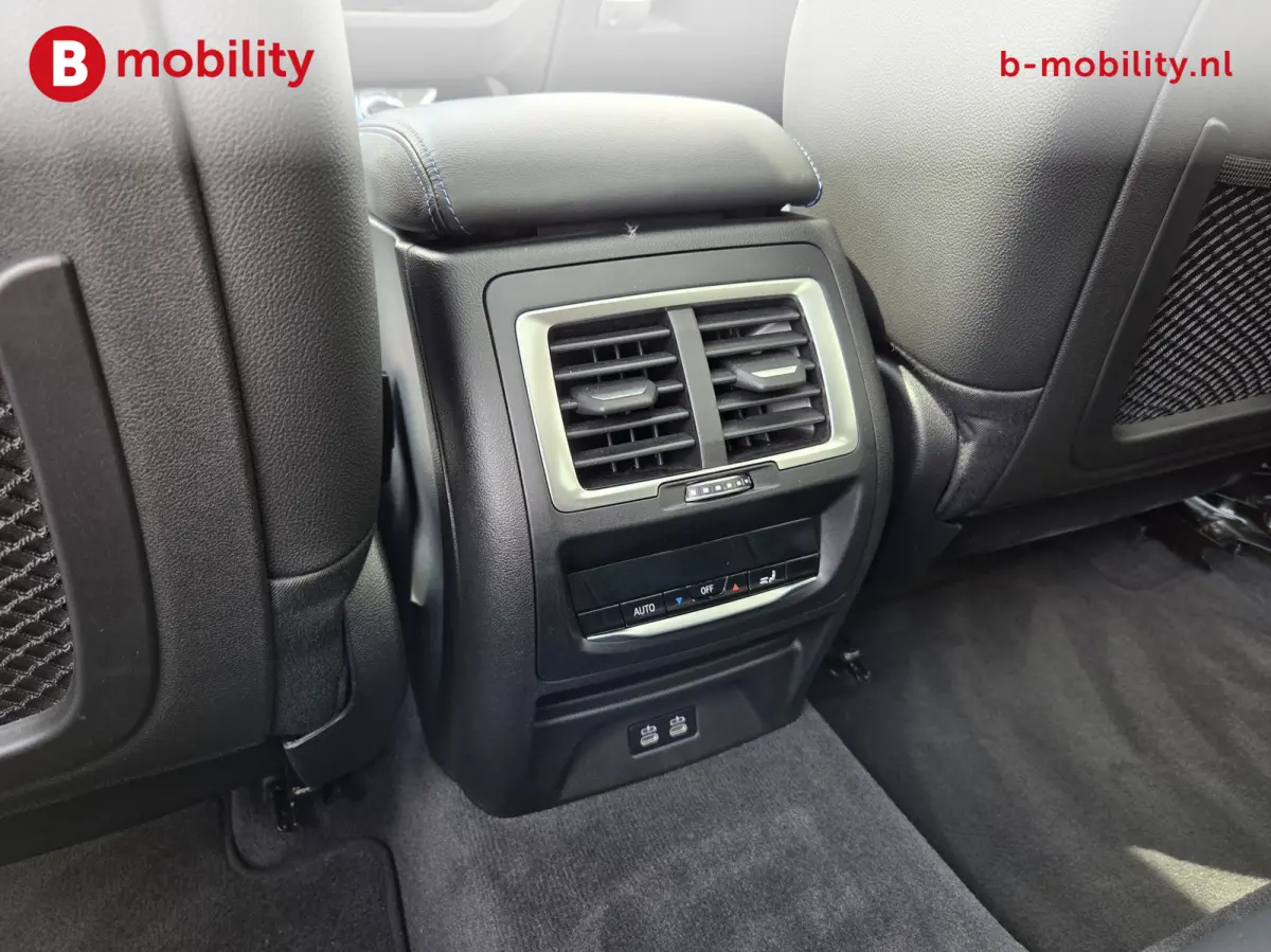 High Executive M-Sport 80 kWh SOH 98% 'Mineral-Weiss' Trekhaak Panoramdak Harman/Kardon | Adaptive Cruise Control | Elek. Stoelen | Head-Up | DAB