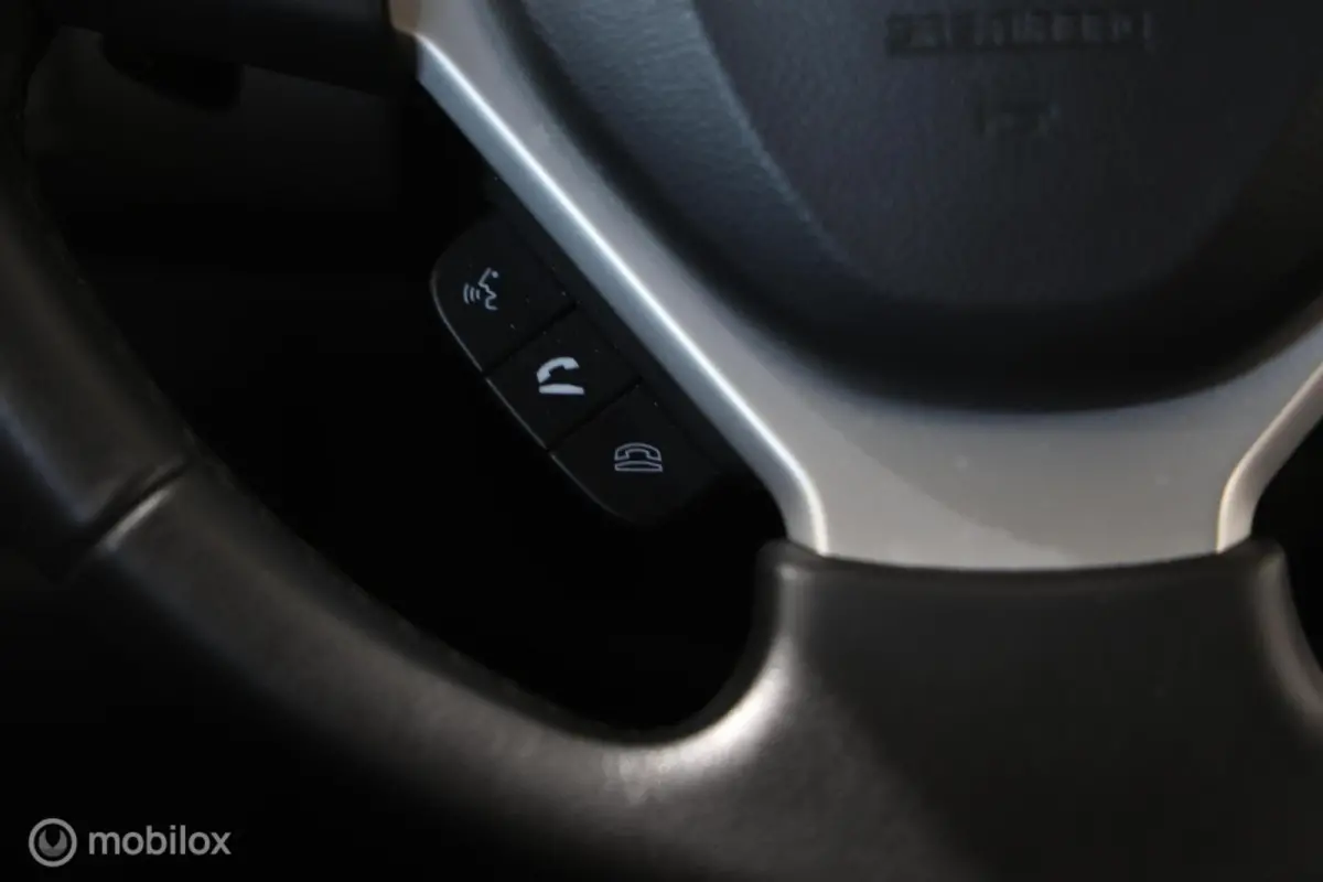 1.0 Boosterjet Stijl - Stoelverwarming - Camera - Bluetooth