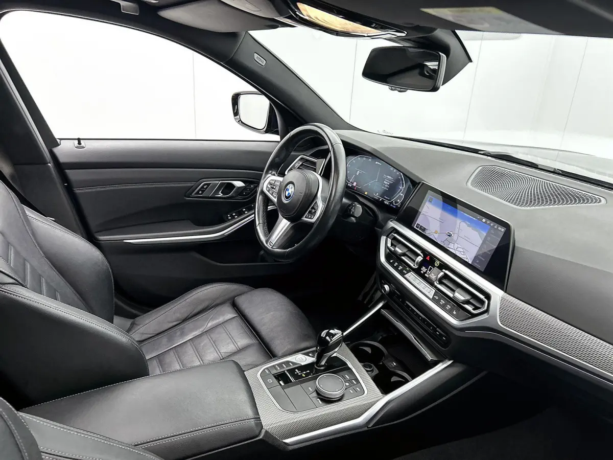 320e | M-SPORT | PANORAMADAK | STOELVERWARMING | NAVIGATIE | LEDER | ELEKTRISCHE ACHTERKLEP | ELEKTRISCHE STOEL |