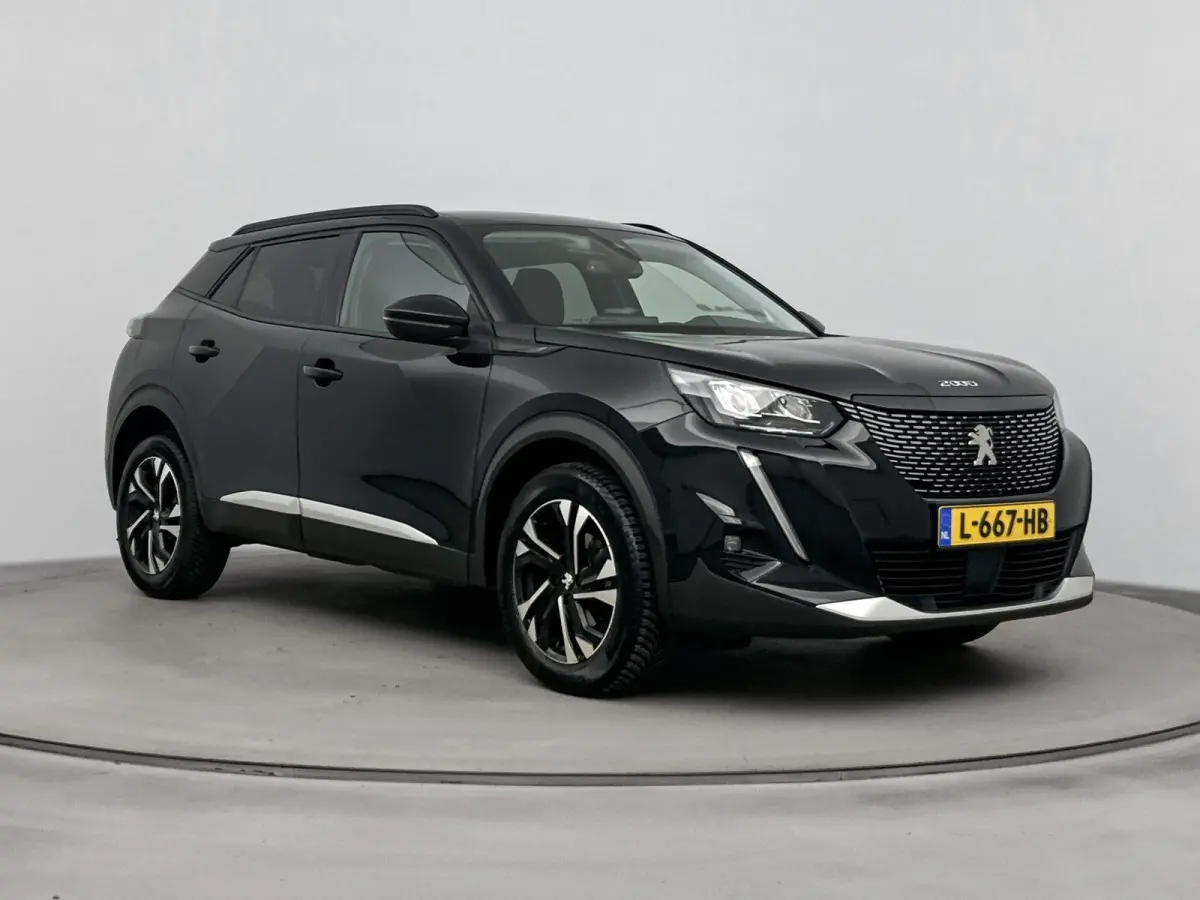 1.2 100pk Allure Pack | 1ste eigenaar | Camera | Navigatie | Lichtmetalen velgen | Cruise control |