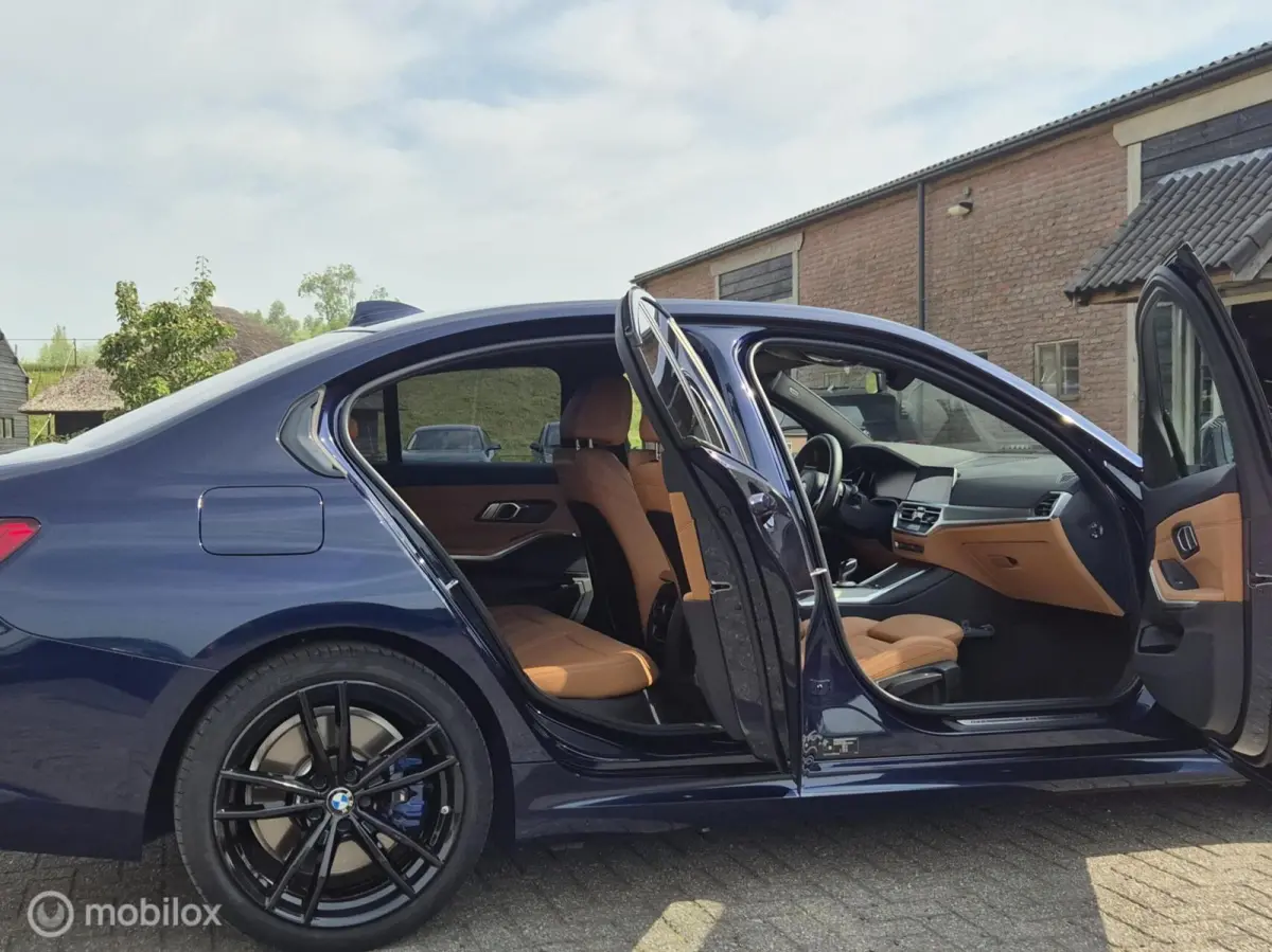 320e Business Edition Plus I Adap Cruise I Camera I Head-up I M-Sport I Tansanitblau I