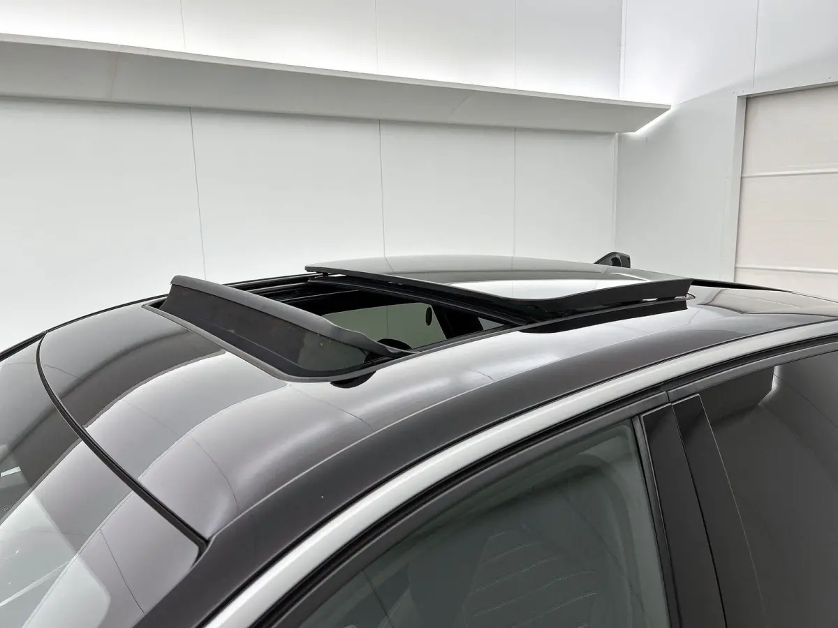 GT Avantage 210pk 73 kWh Automaat | Schuif-/kanteldak | Elektrisch Verstelb. Bestuurdersstoel | Focal-Geluidssysteem | Drive Assist Plus Pack | 3 Fase | Warmtepomp | Elektrische Klep | Matri