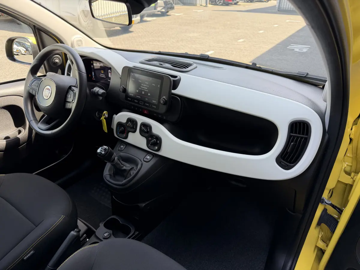 1.0 Cross (Airco - Navigatie via APP - Parkeersensoren - Apple Carplay - Cruise Controle)