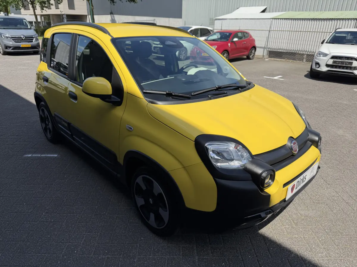 1.0 Cross (Airco - Navigatie via APP - Parkeersensoren - Apple Carplay - Cruise Controle)