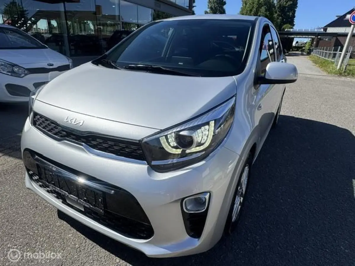 1.0 DPi Dynamic Edition - Stoel & Stuurverwarming, Navigatie via Carplay, Camera achter, Airco, Electr ramen en spiegels, Deurvergr. met afst.diening, Priveglas, Sport Velgen