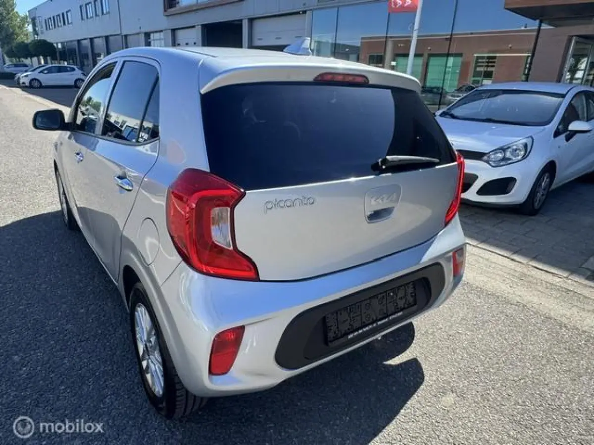 1.0 DPi Dynamic Edition - Stoel & Stuurverwarming, Navigatie via Carplay, Camera achter, Airco, Electr ramen en spiegels, Deurvergr. met afst.diening, Priveglas, Sport Velgen