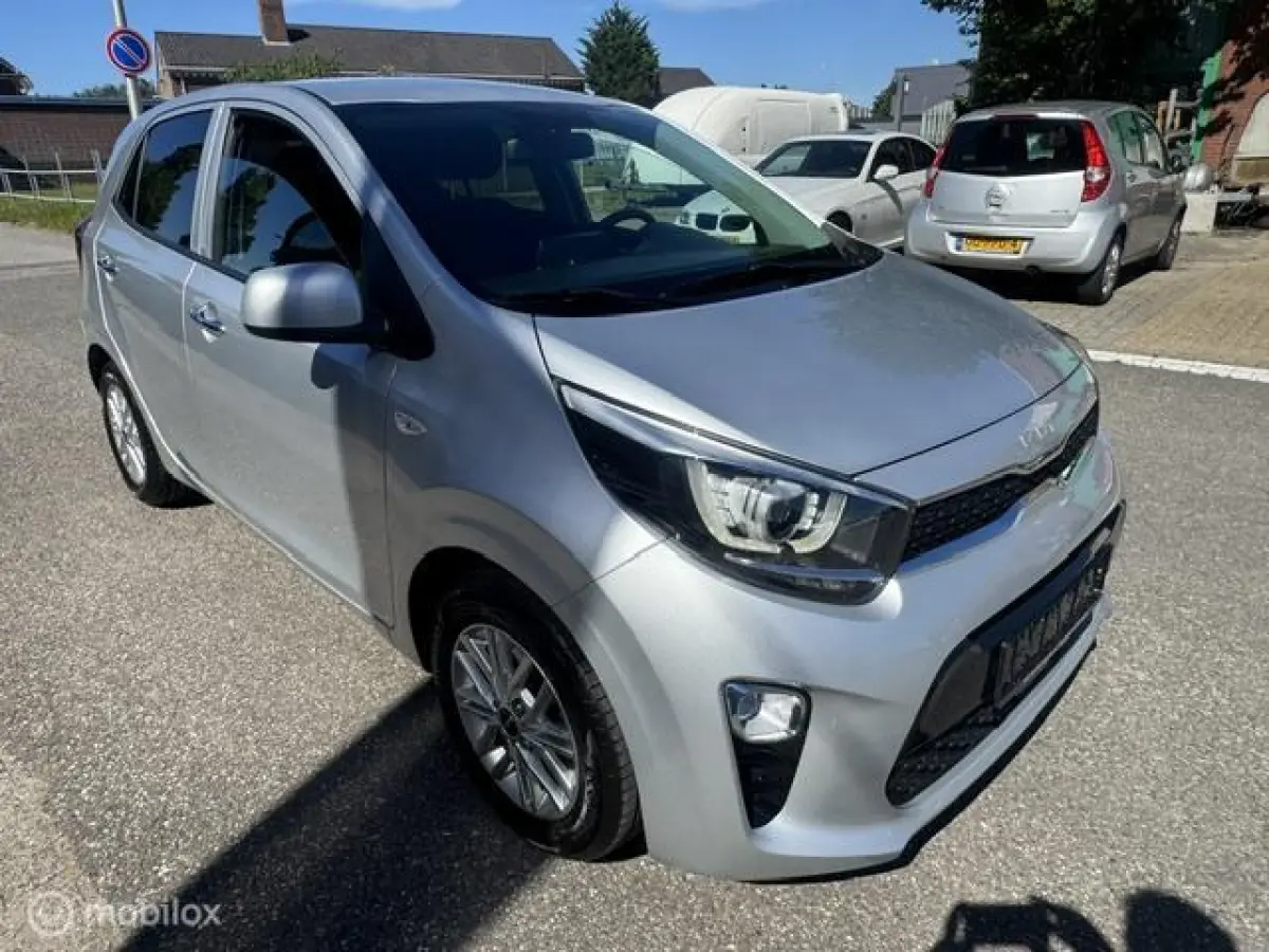 1.0 DPi Dynamic Edition - Stoel & Stuurverwarming, Navigatie via Carplay, Camera achter, Airco, Electr ramen en spiegels, Deurvergr. met afst.diening, Priveglas, Sport Velgen