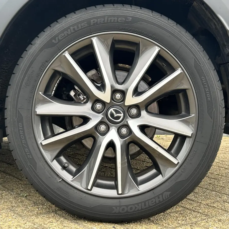 2.0 SkyActiv-G 120 GT-M 120PK | 2e Eigenaar | NL AUTO | 18 Inch | Navigatie | Achteruitrijcamera | Climate Control | Head Up Display | BOSE | Lederen Bekleding | Elektrische Stoelen | Stoelv